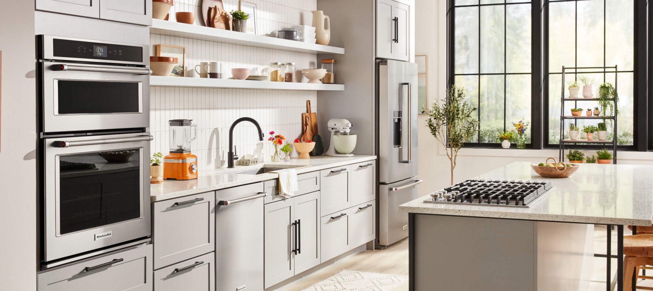 A bright kitchen with a variety of KitchenAid® products.