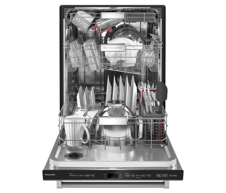 An open KitchenAid® 44 dBA Dishwasher in PrintShield™ Finish with FreeFlex™ Third Rack full of dishes and glassware