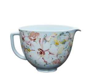 
                               Red stand mixer using fresh prep attachment to cut zucchini into sheets.
                           