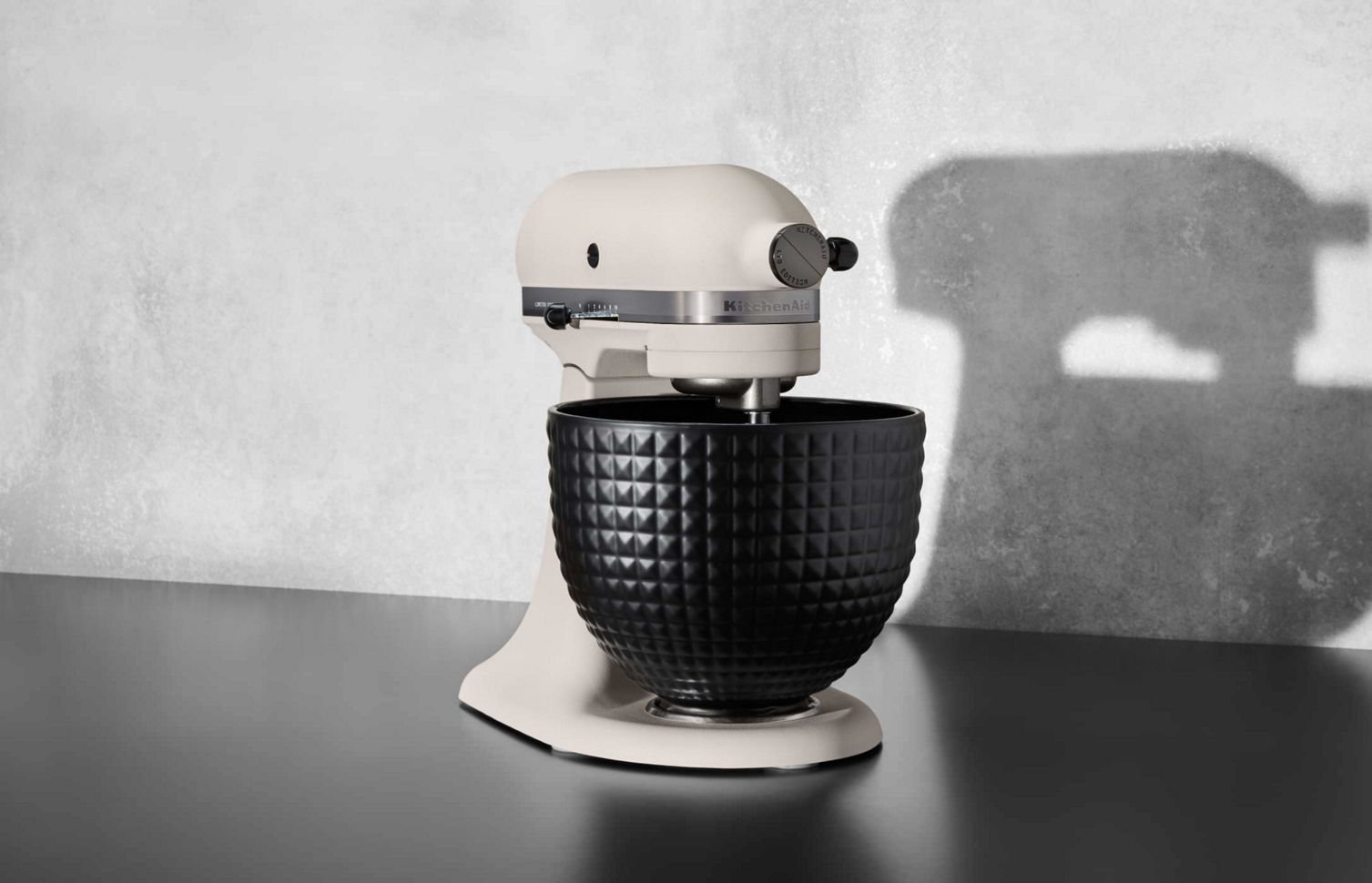 A stand-alone Limited Edition Stand Mixer with a black ceramic studded bowl.