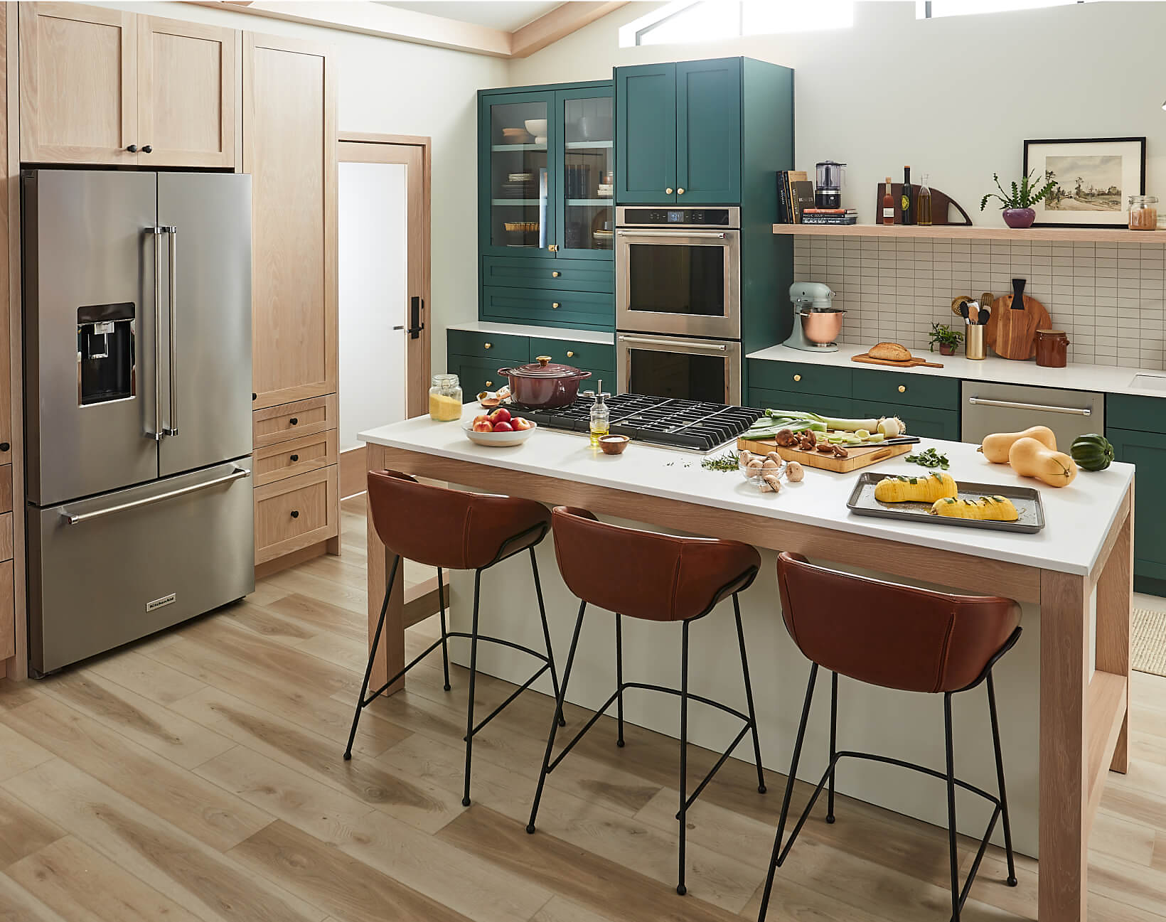 A stylish, modern kitchen filled with KitchenAid® appliances. 