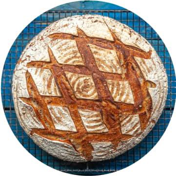 A crosshatch design on baked bread.