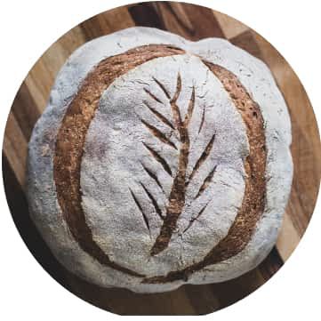 A wheat stalk design on baked bread.