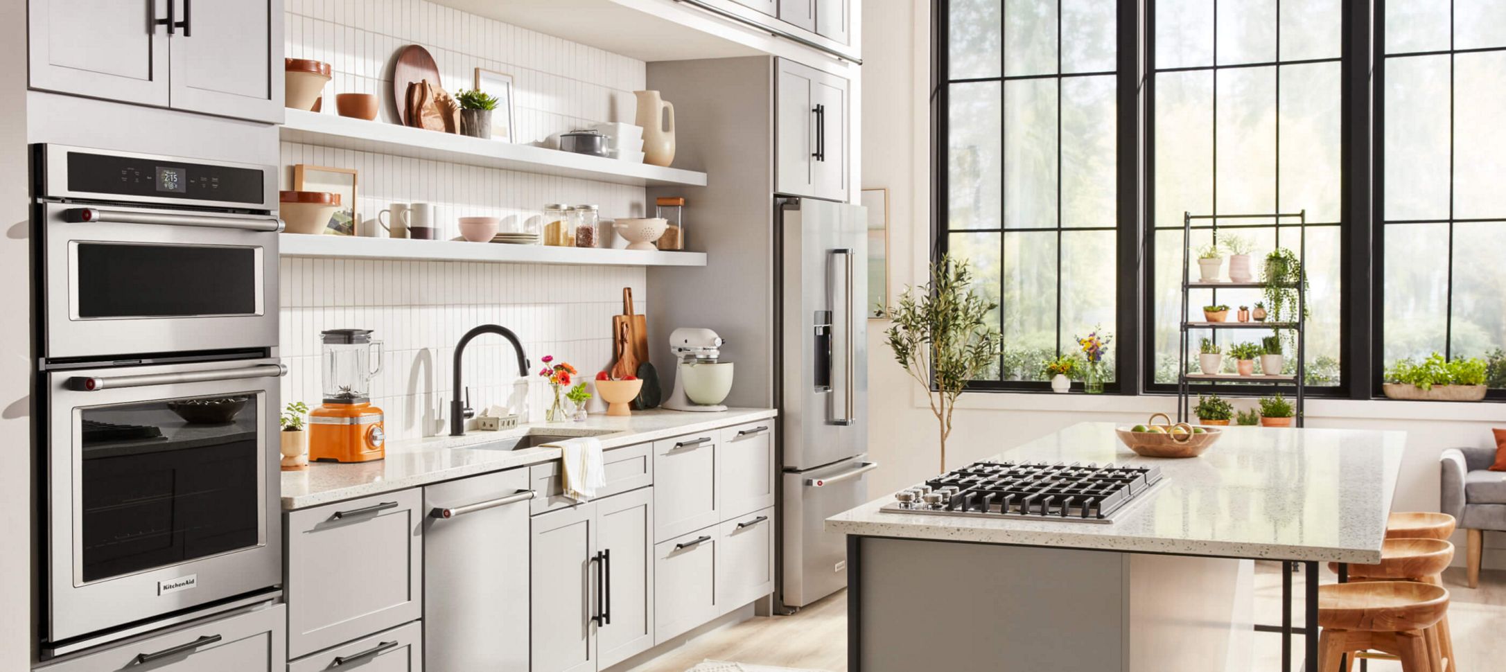 A bright kitchen with a variety of KitchenAid® products.