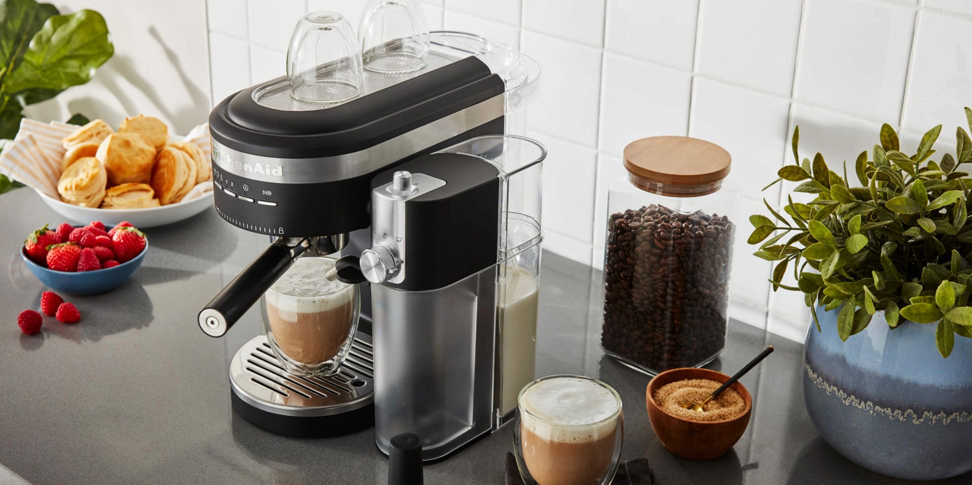 A Matte Black Semi-Automatic Espresso Machine and Automatic Milk Frother.