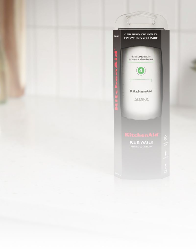 KitchenAid® Water Filter resting on a counter.