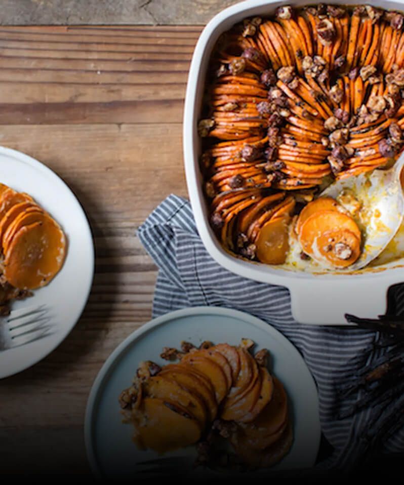 A sweet potato casserole being prepared for a gathering. 