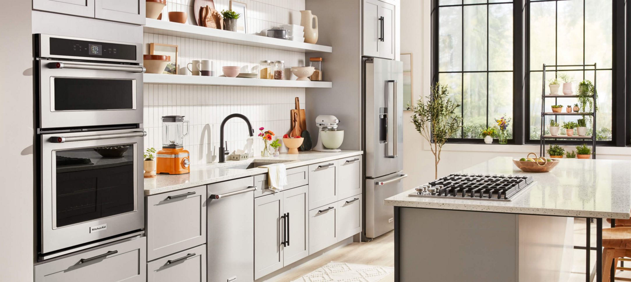 A clean kitchen with a variety of KitchenAid® products.