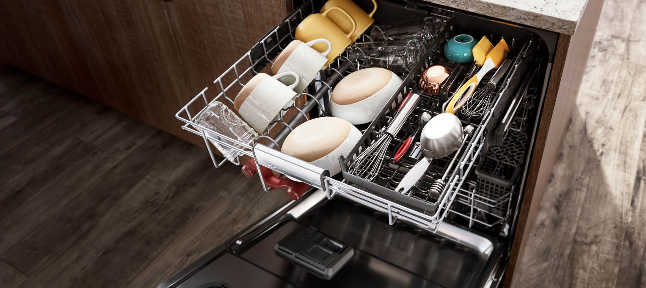 A dishwasher filled with clean dishes.
