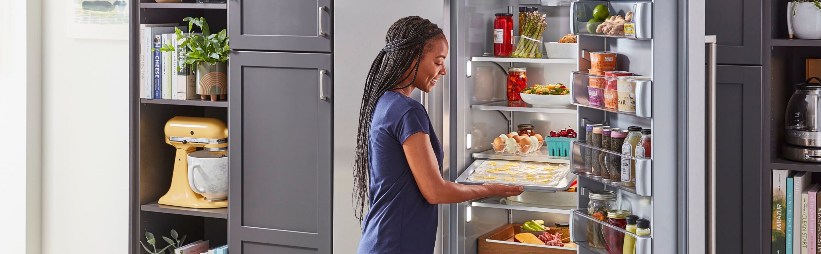 A modern kitchen with a KitchenAid® refrigerator.