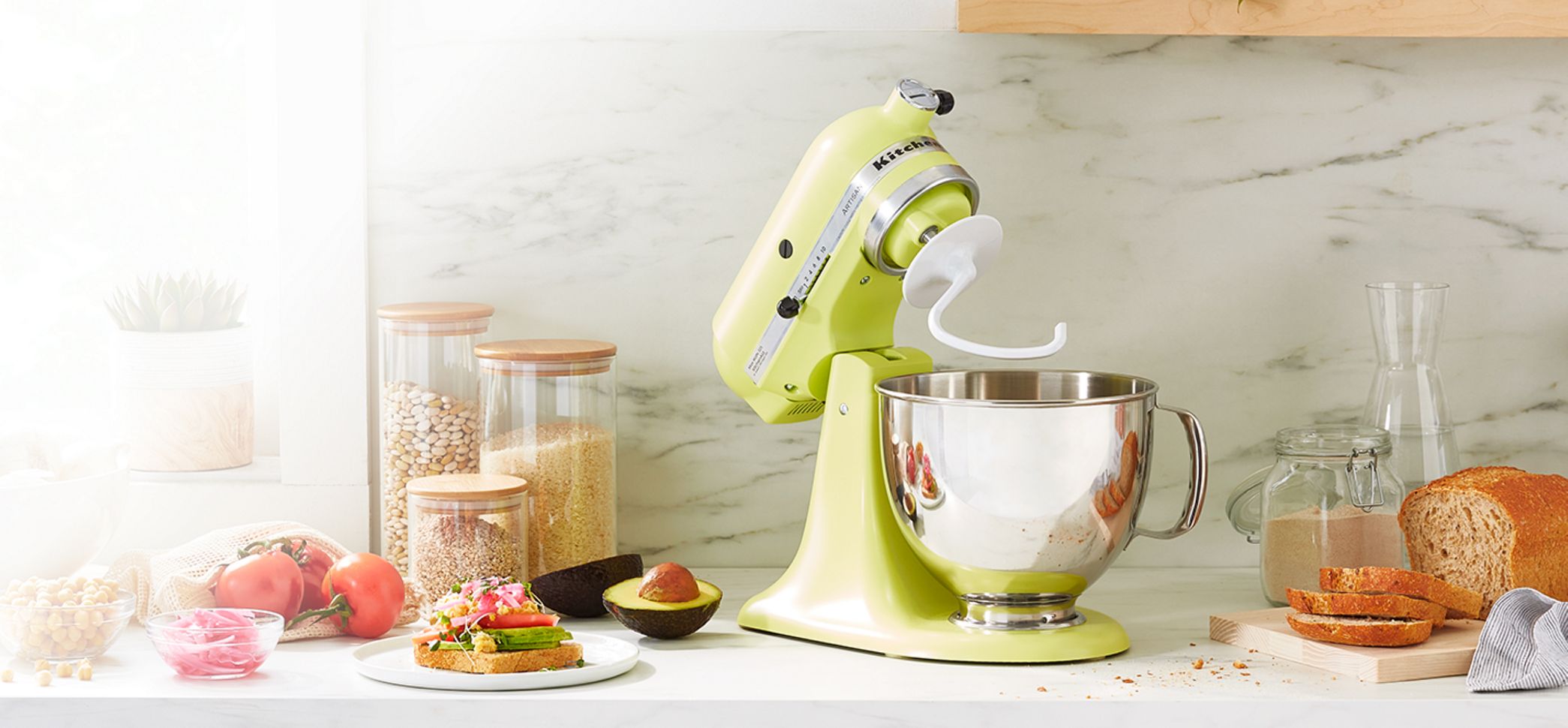 KitchenAid® Artisan® Series stand mixer with dough hook, shown in Kyoto Glow color option.
