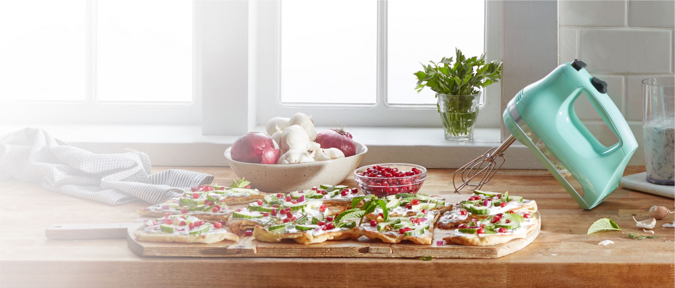Flatbread shown with a KitchenAid® hand mixer.