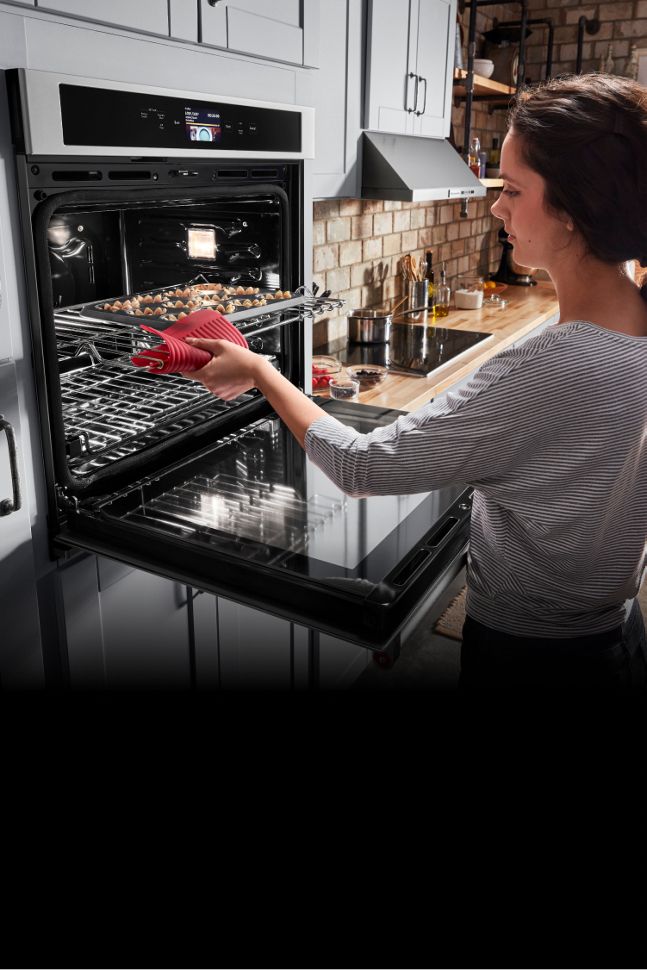 Cooking in a KitchenAid® wall oven.