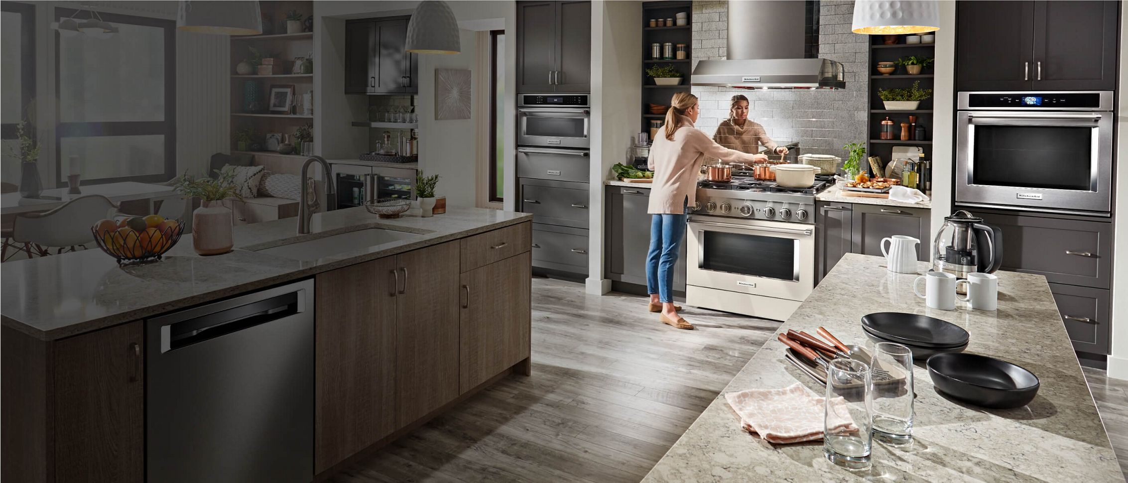 Cooking in a fully equipped KitchenAid® kitchen.