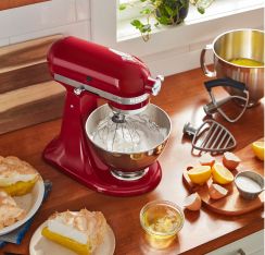 KitchenAid® Stand Mixer with whisk and two different beater attachments.