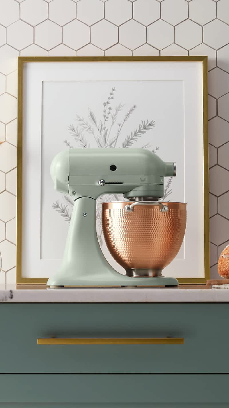 A Blossom Stand Mixer in a bright kitchen with botanical accents. 