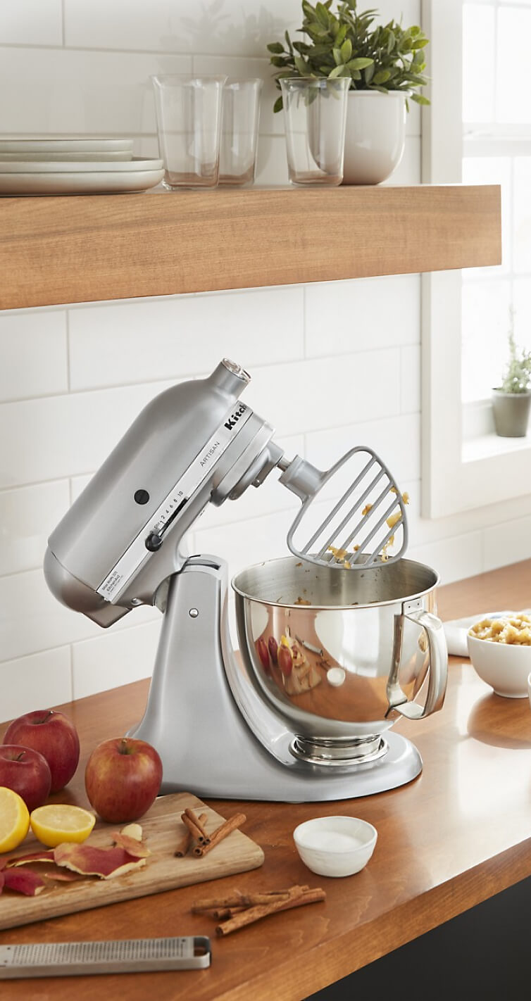 A silver KitchenAid® Stand Mixer with Pastry Beater Accessory.