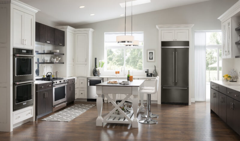 White kitchen with black stainless and stainless appliances