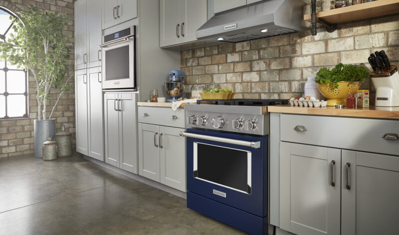Grey kitchen with blue commercial style range