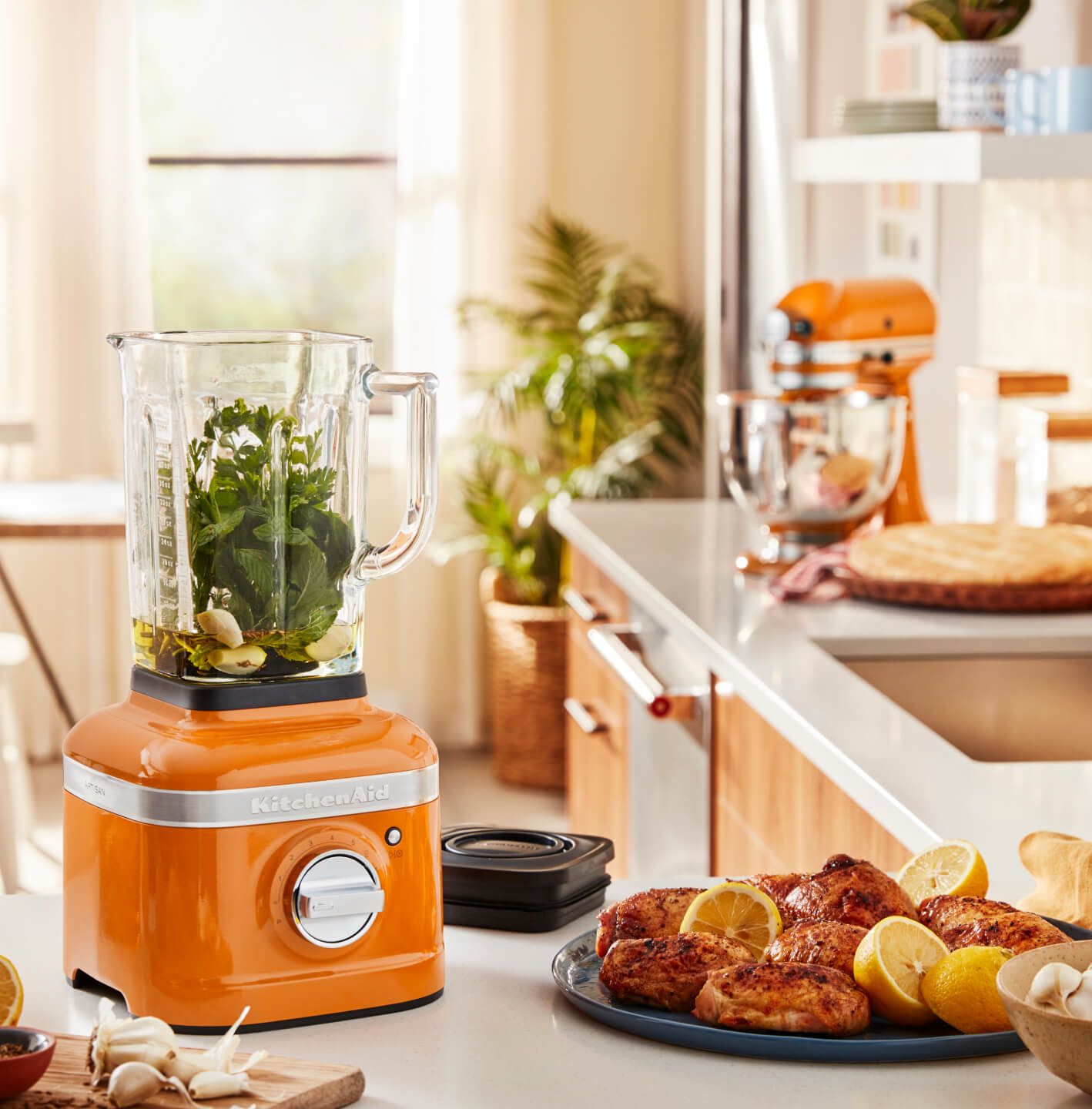 A KitchenAid® Blender and Stand Mixer in Honey.