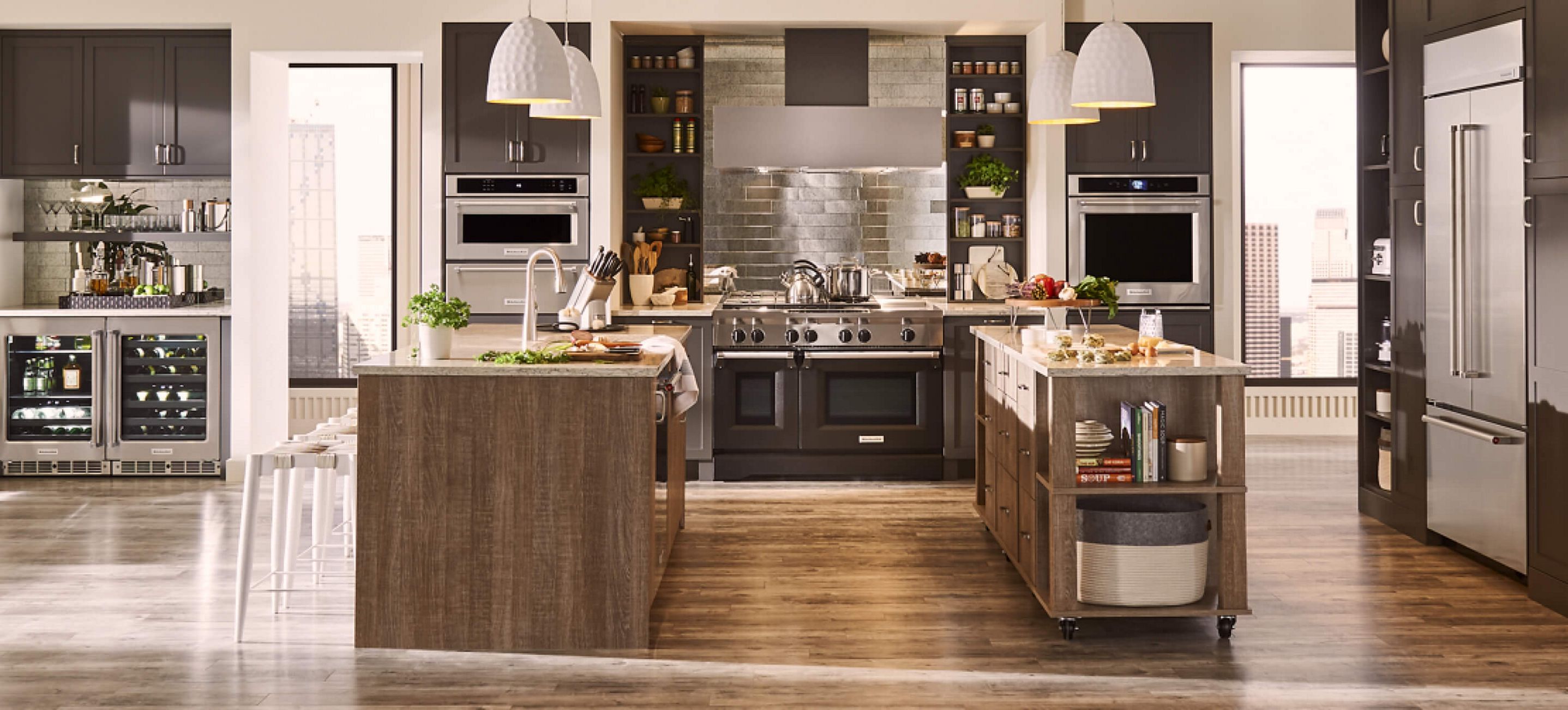 Modern kitchen with a suite of stainless KitchenAid® appliances.