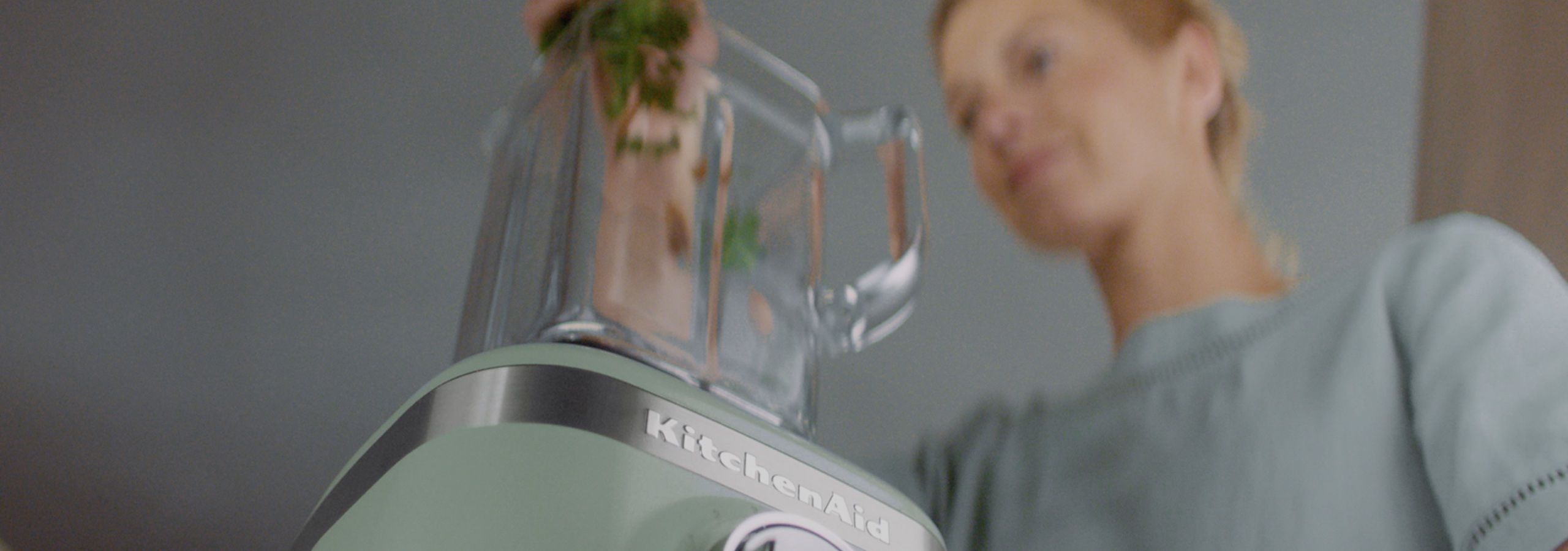 Closeup view of a KitchenAid® stand mixer in action