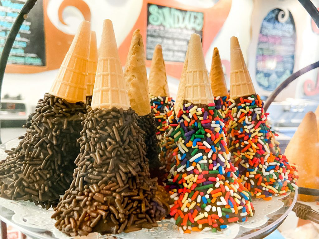 Ice cream cones covered in chocolate and sprinkles from The Zebra Striped Whale.