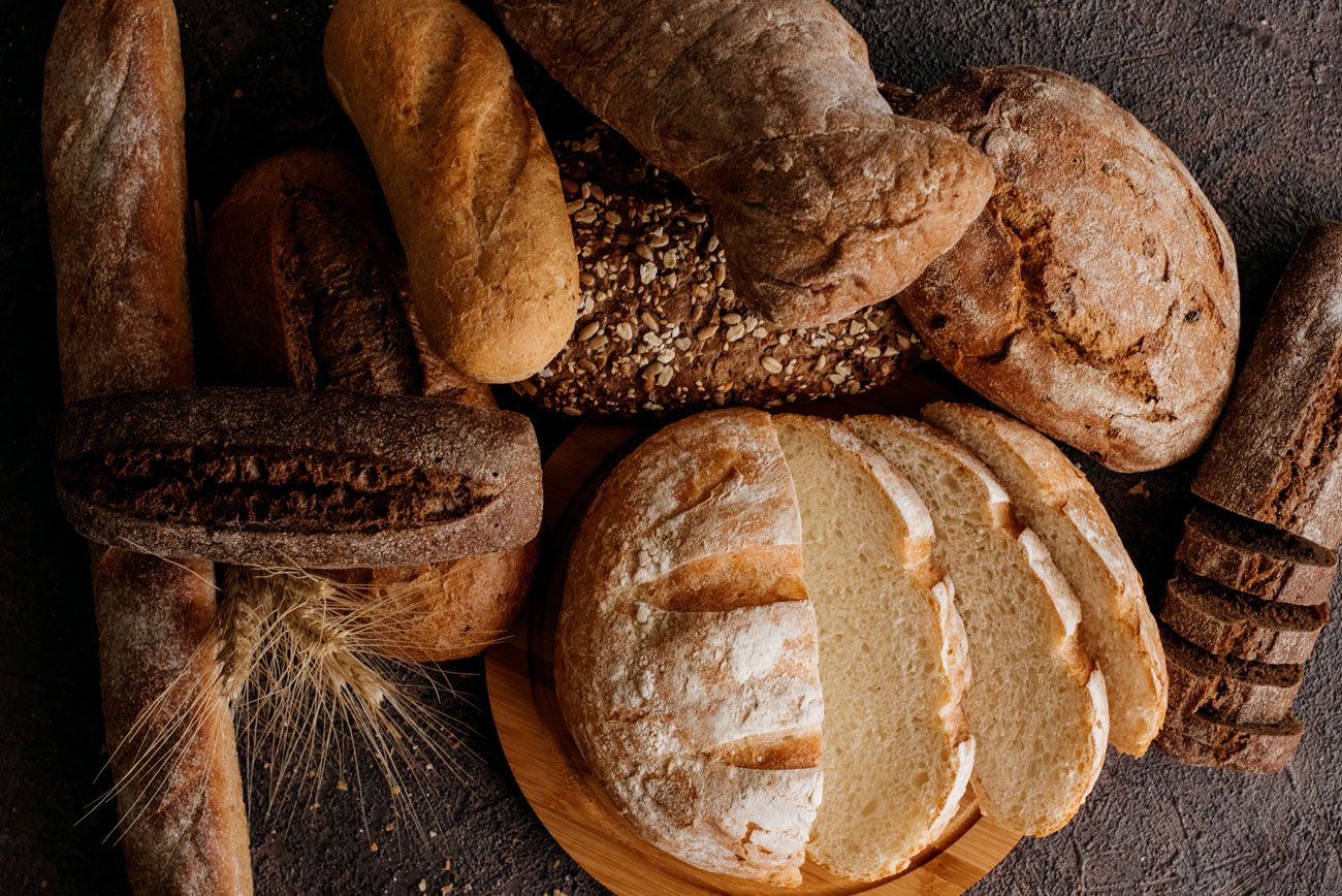 A variety of fresh loaves of bread.