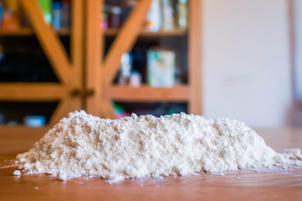 A pile of flour resting on a table.