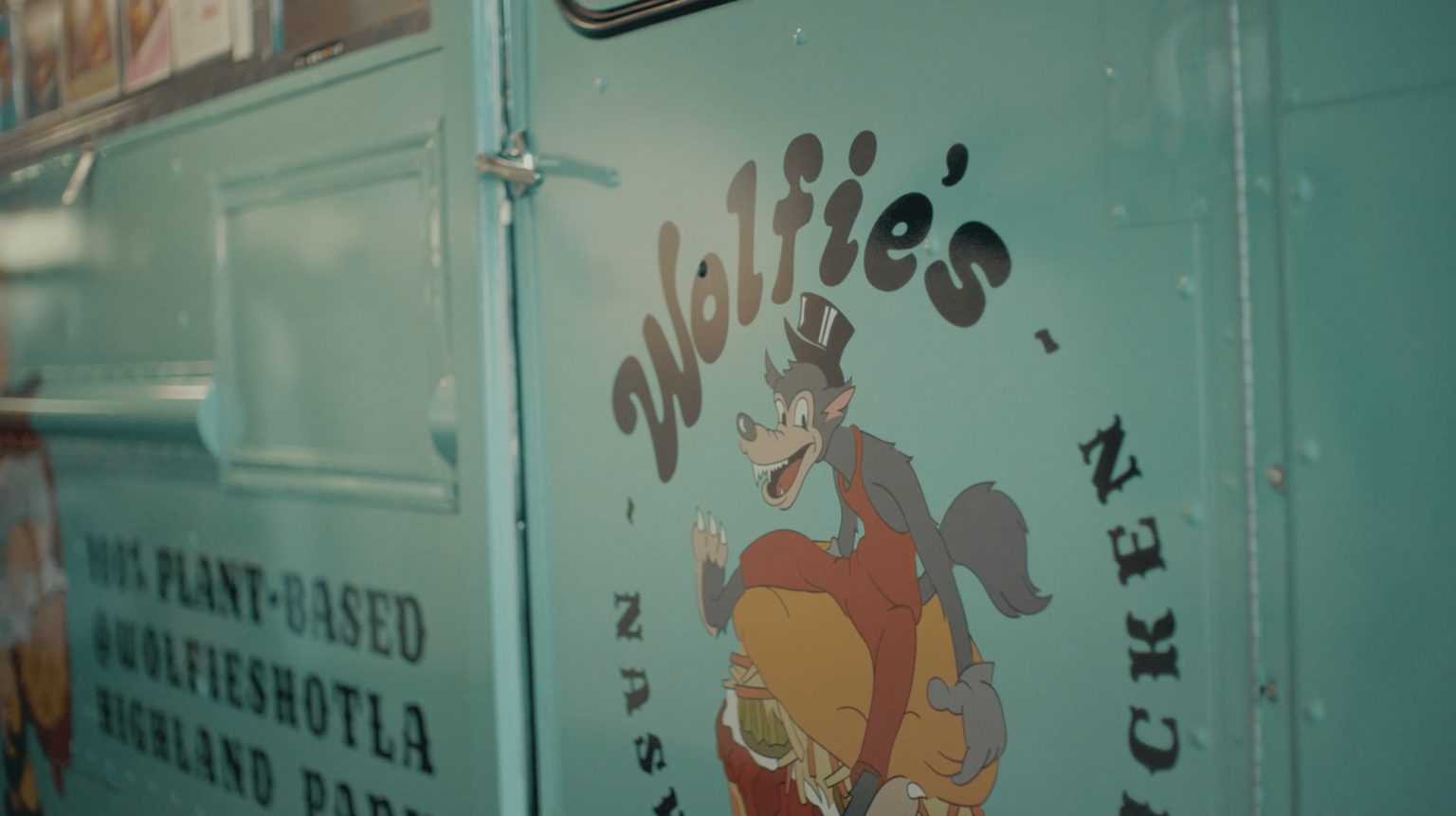 The door of Woflie’s Nashville Hot Chicken food truck.