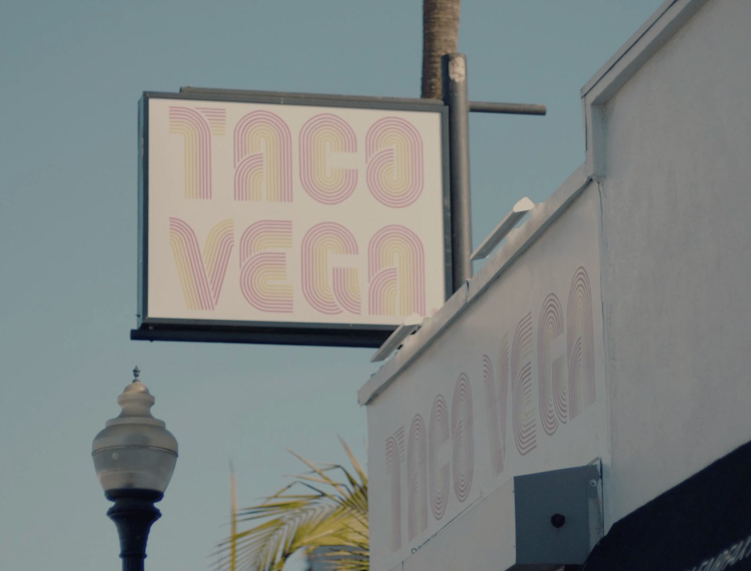 The outdoor sign of Taco Vega.