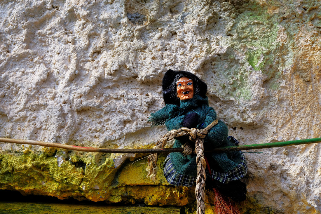 A doll of La Befana, or good witch.