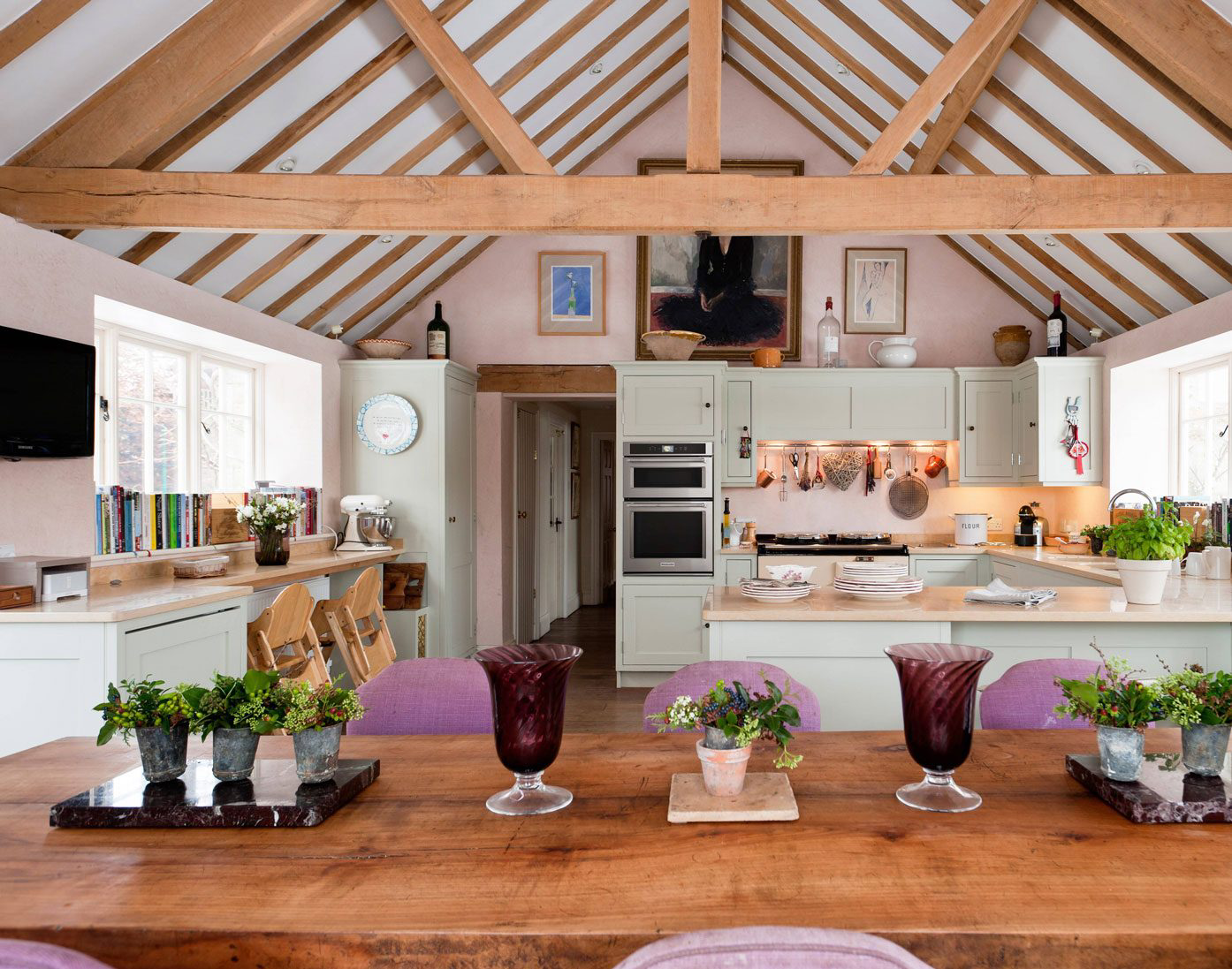 A bright kitchen with soft beetroot shades.