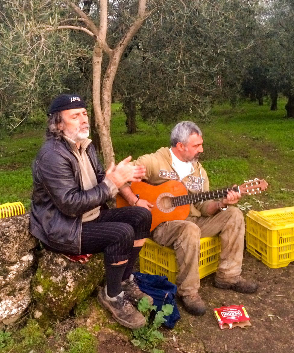 Two people playing music.
