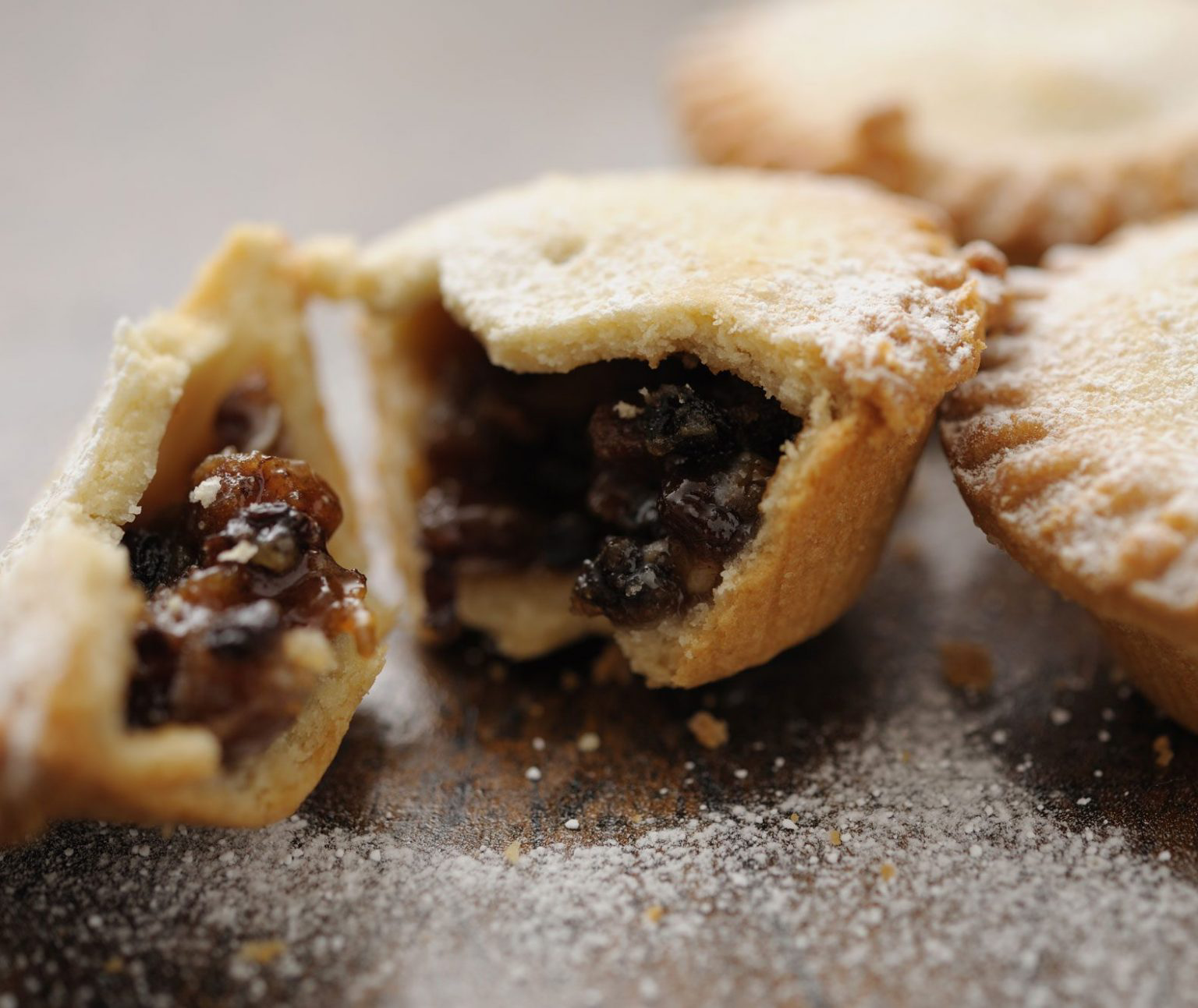 A mince pie broken apart to show its inside.