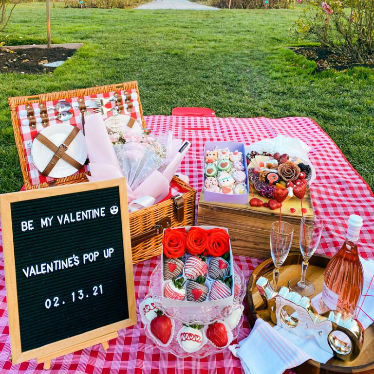 A Valentine's Day picnic set at the park.