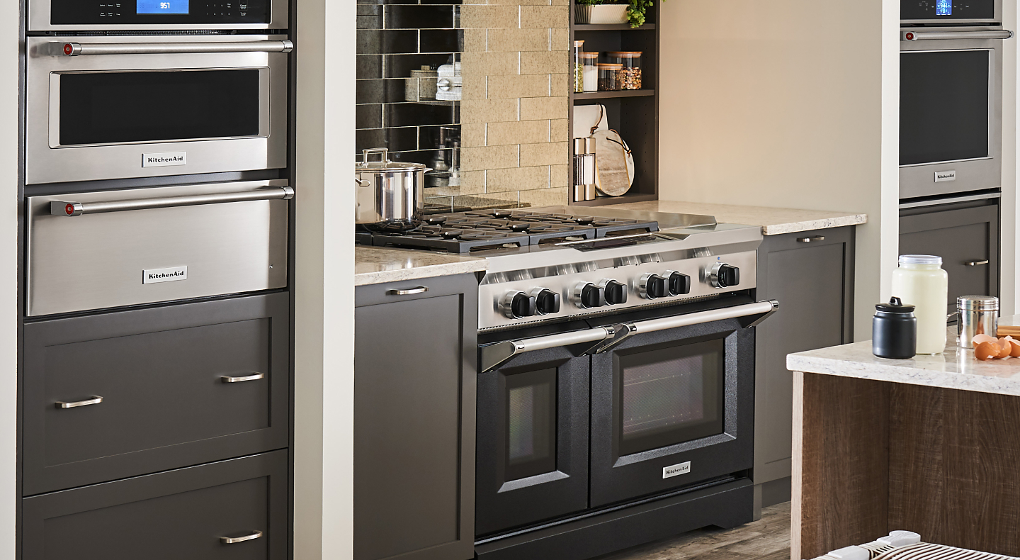 A modern kitchen with appliances from KitchenAid brand.