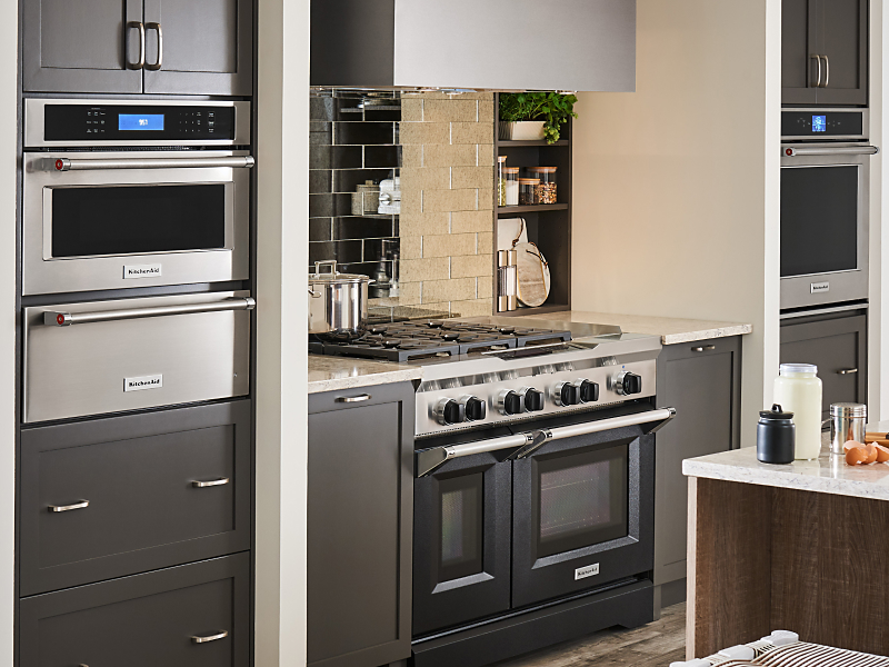 A modern kitchen with appliances from KitchenAid brand.