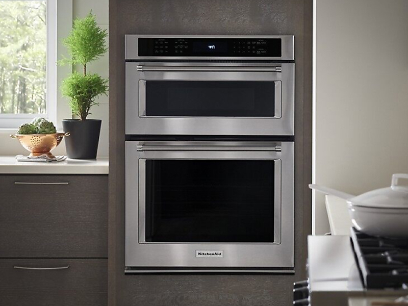 A stainless steel KitchenAid® combination wall oven.