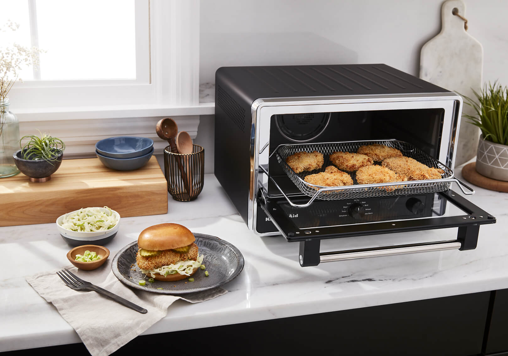 KitchenAid® Digital Countertop Oven with air fried chicken.