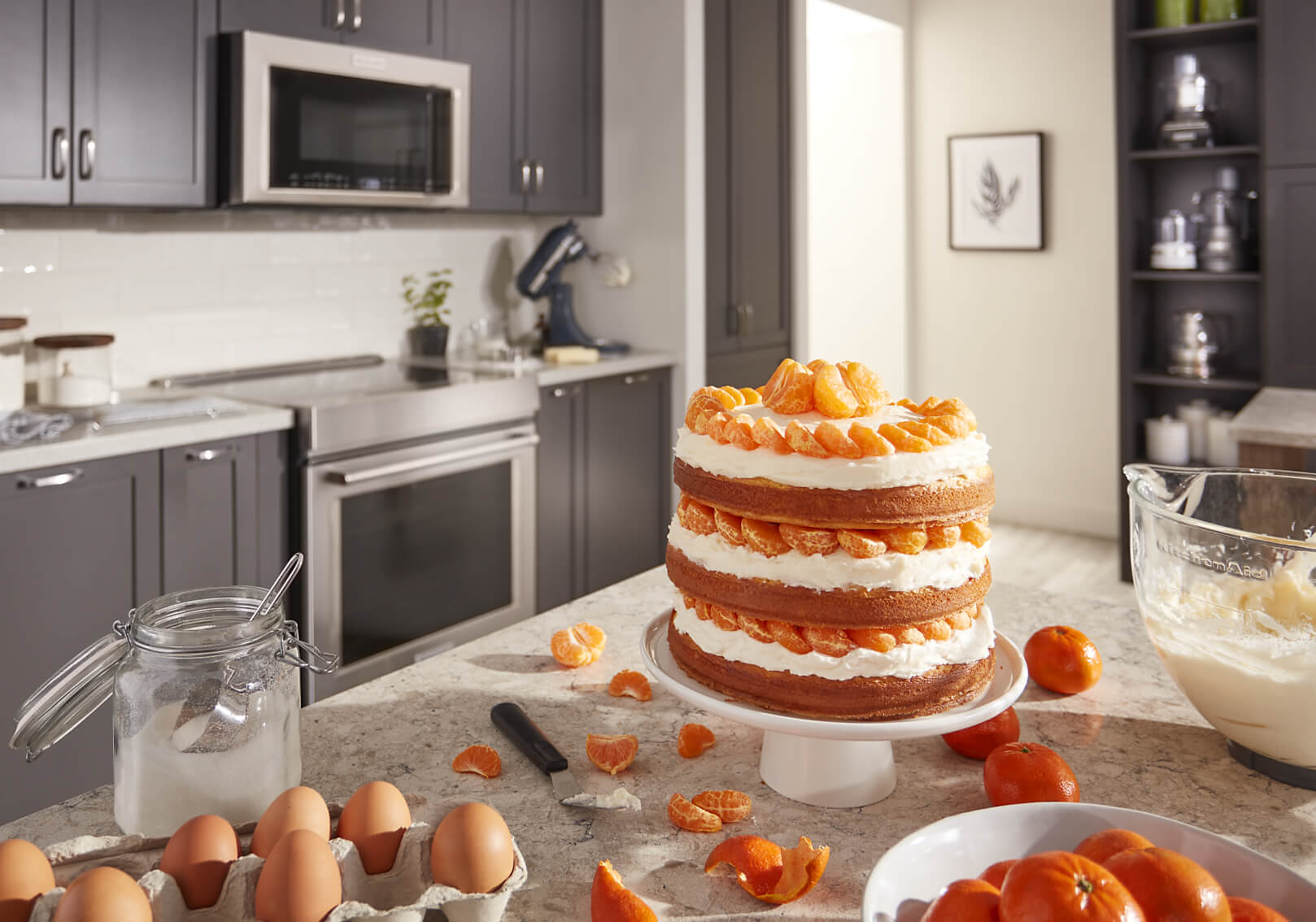 A layered cake with tangerines and cream A layered cake with tangerines and cream