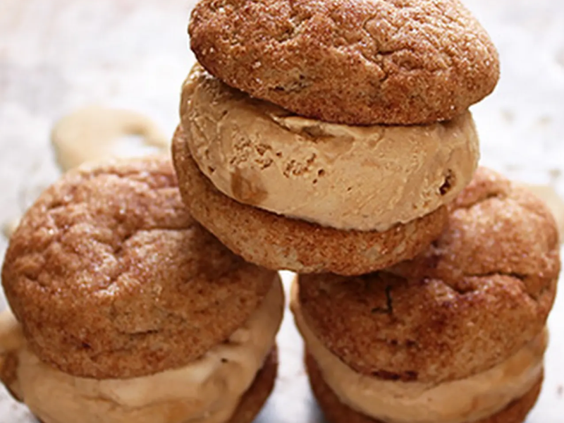 Brown dulce de leche banana ice cream sandwiches stacked together