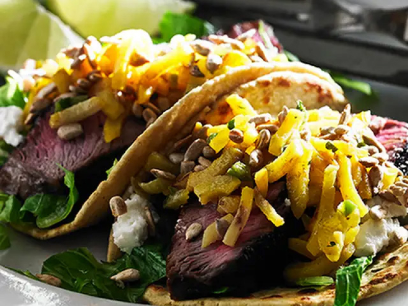 Close-up of sirloin tacos with beet salsa