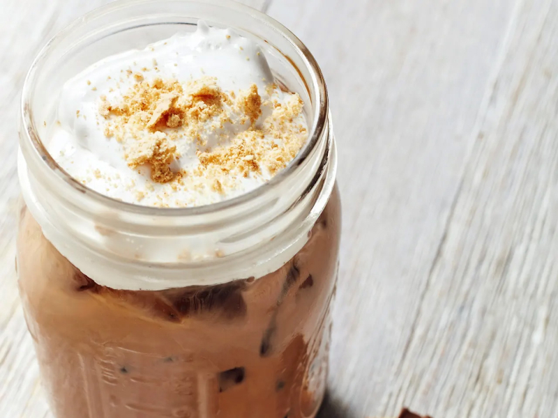 Chocolate coffee drink in mason jar with marshmallow topping