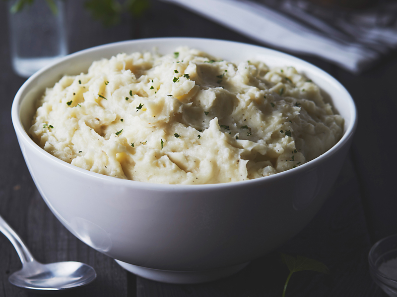 Mashed potatoes in white bowl