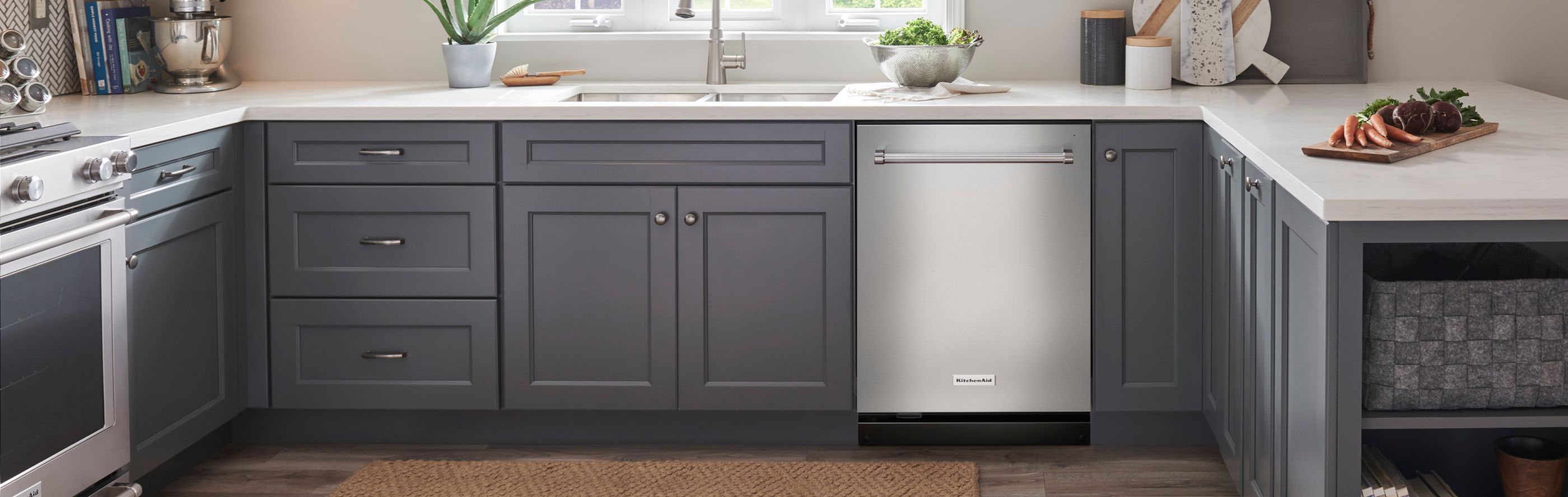A stainless steel KitchenAid® dishwasher in a modern kitchen