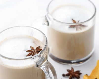 Two mugs of spiked mulled latte