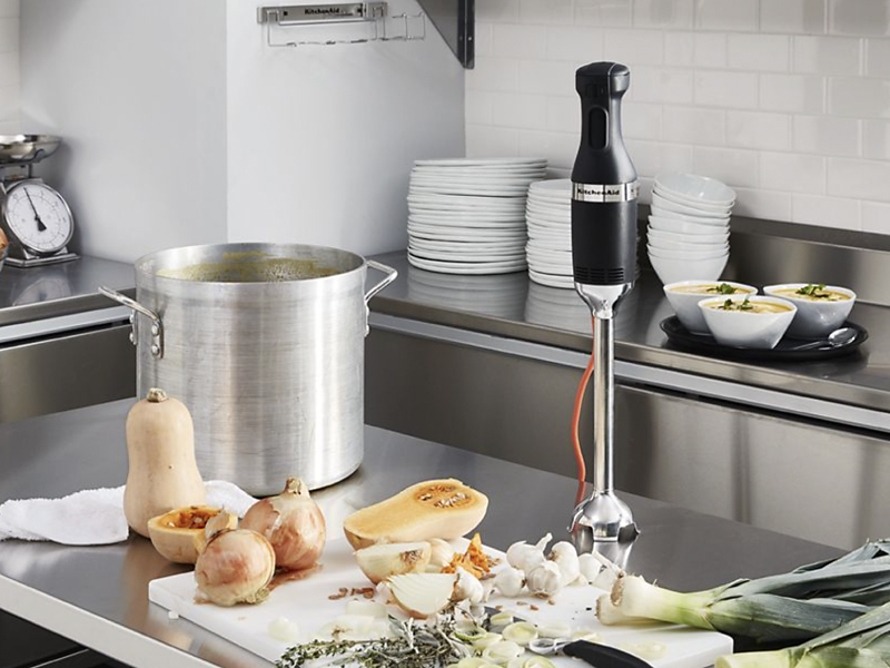 Commercial immersion blender on metal countertop