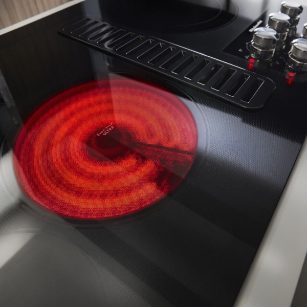 Heating element activated and glowing red on an electric cooktop