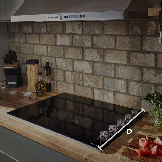 Cooktop diagram highlighting where to measure depth